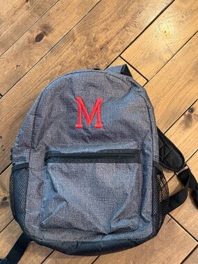 Going My Way Backpack with Red 'M' Accent by 31